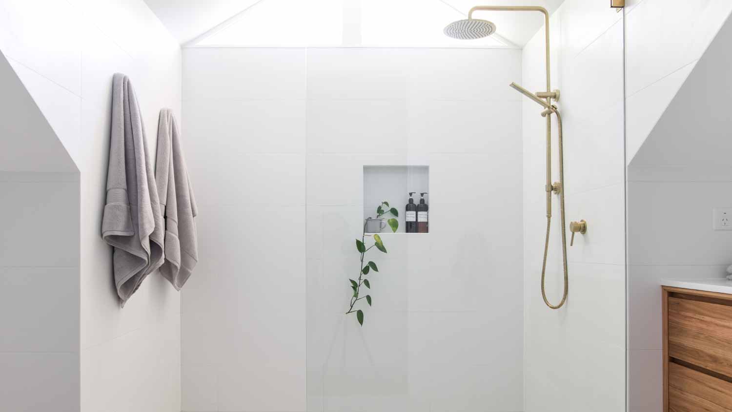 Modern bathroom white tiled shower