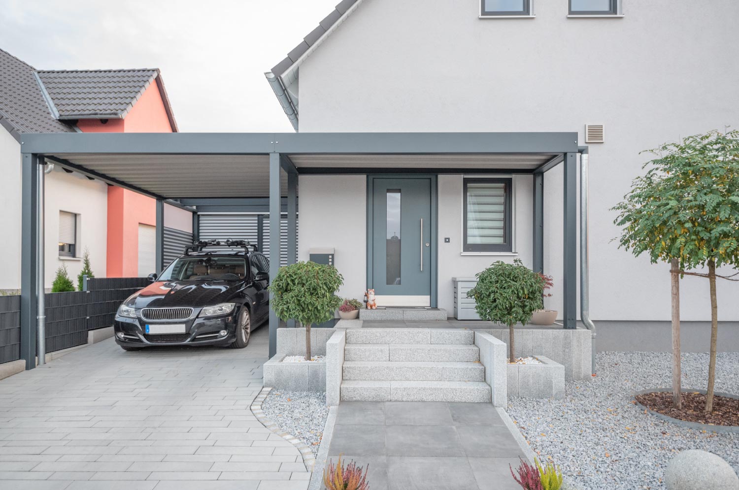 Modern carport with a car inside