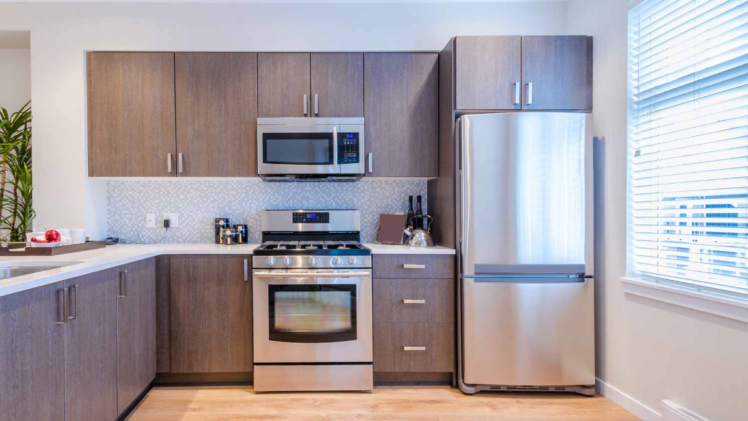 Modern kitchen with silver appliances 