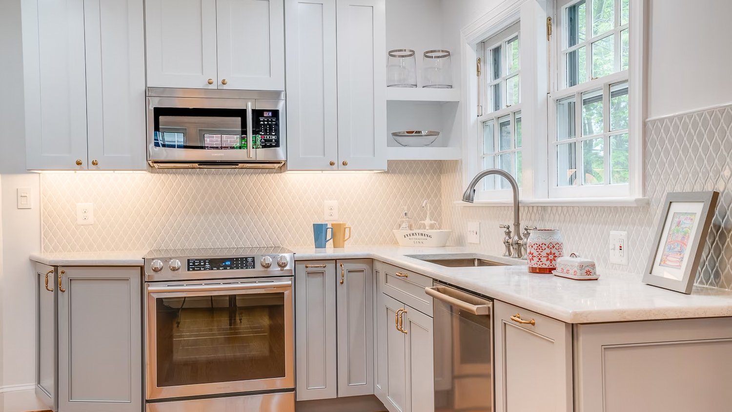 Modern white kitchen with gray furniture