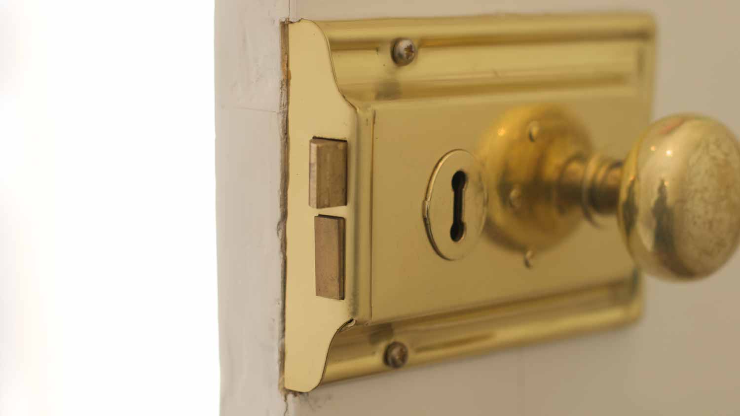 Open door with brass lock and knob 