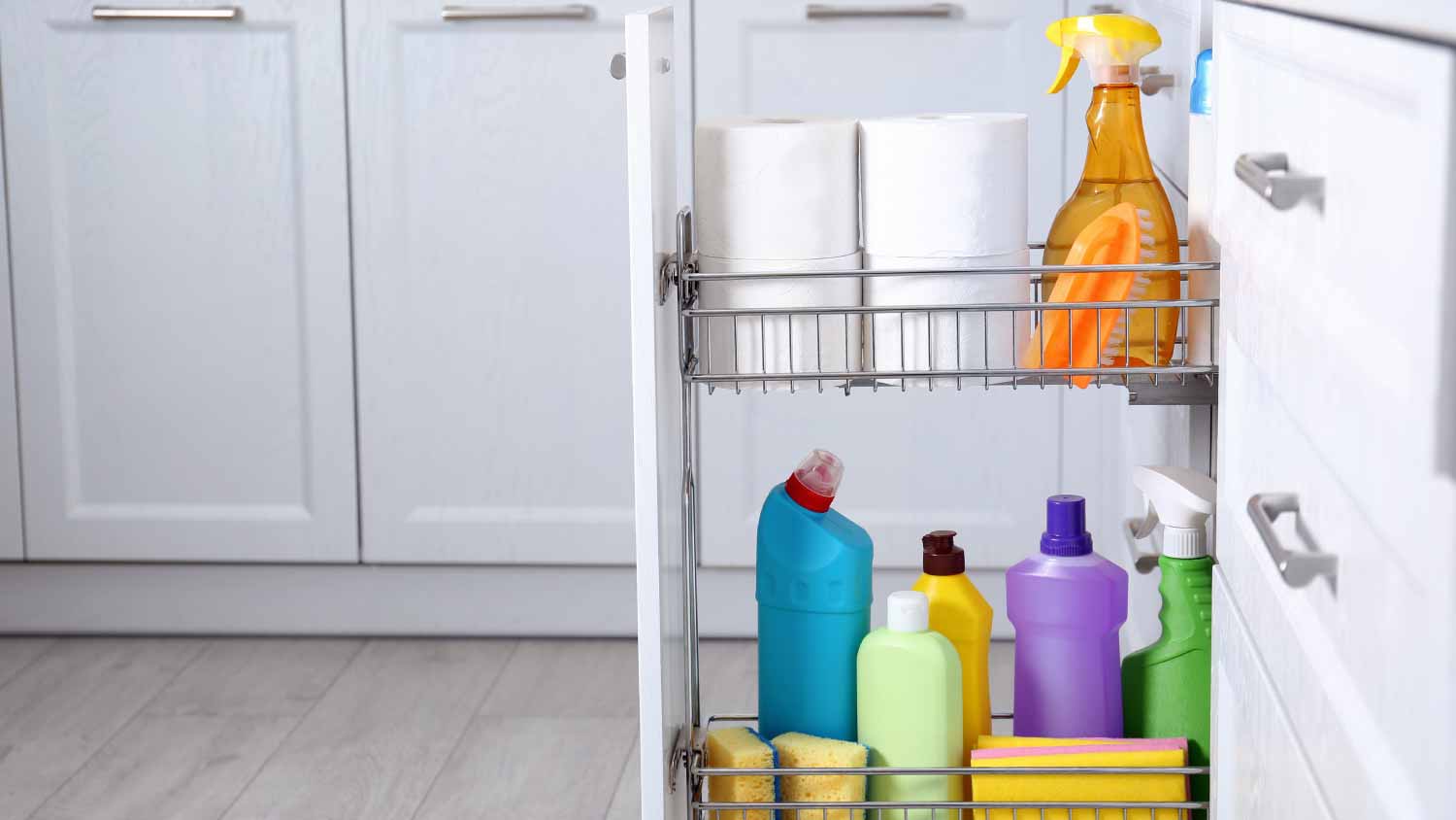 Open drawer with different cleaning supplies