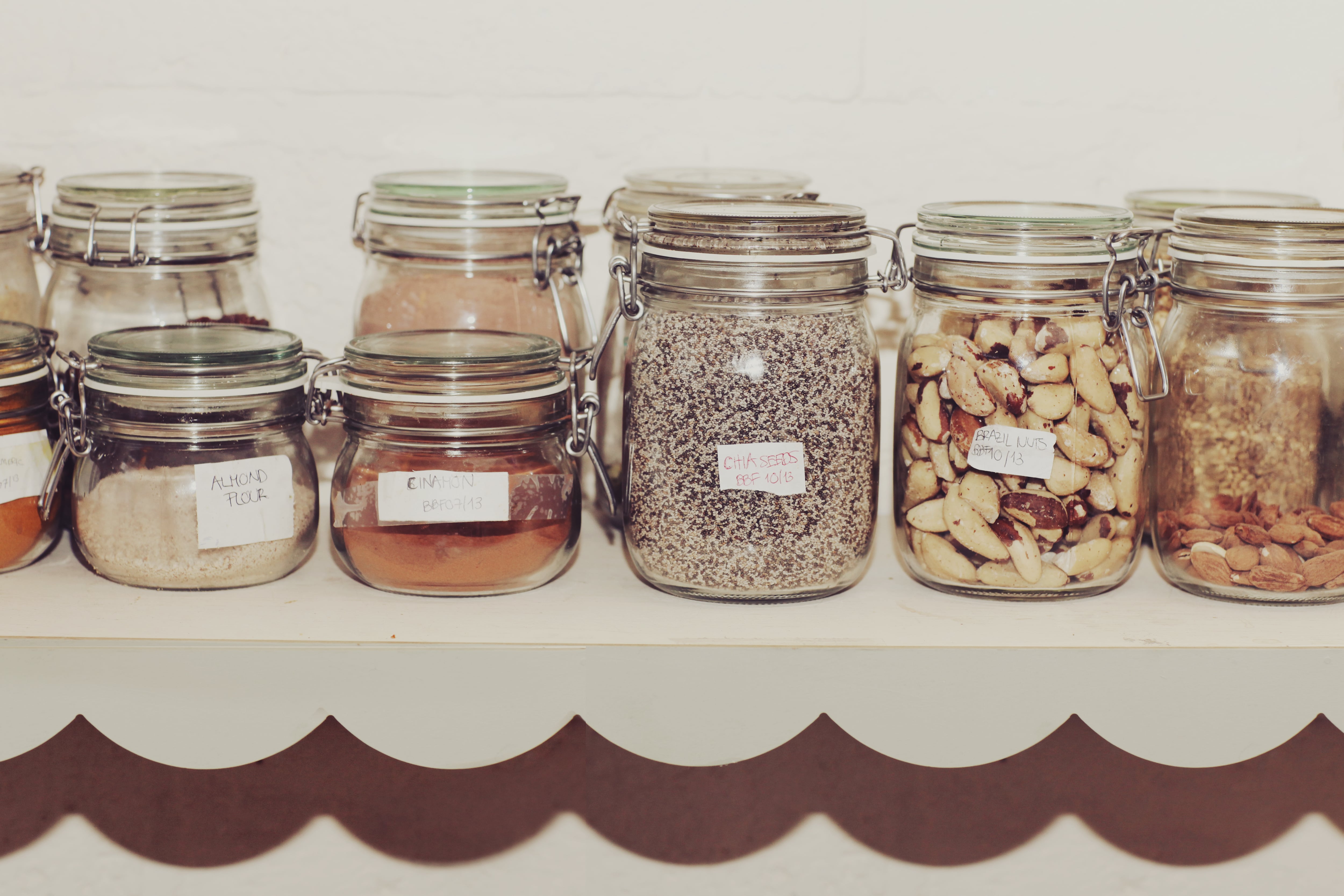 Small jars on kitchen shelf