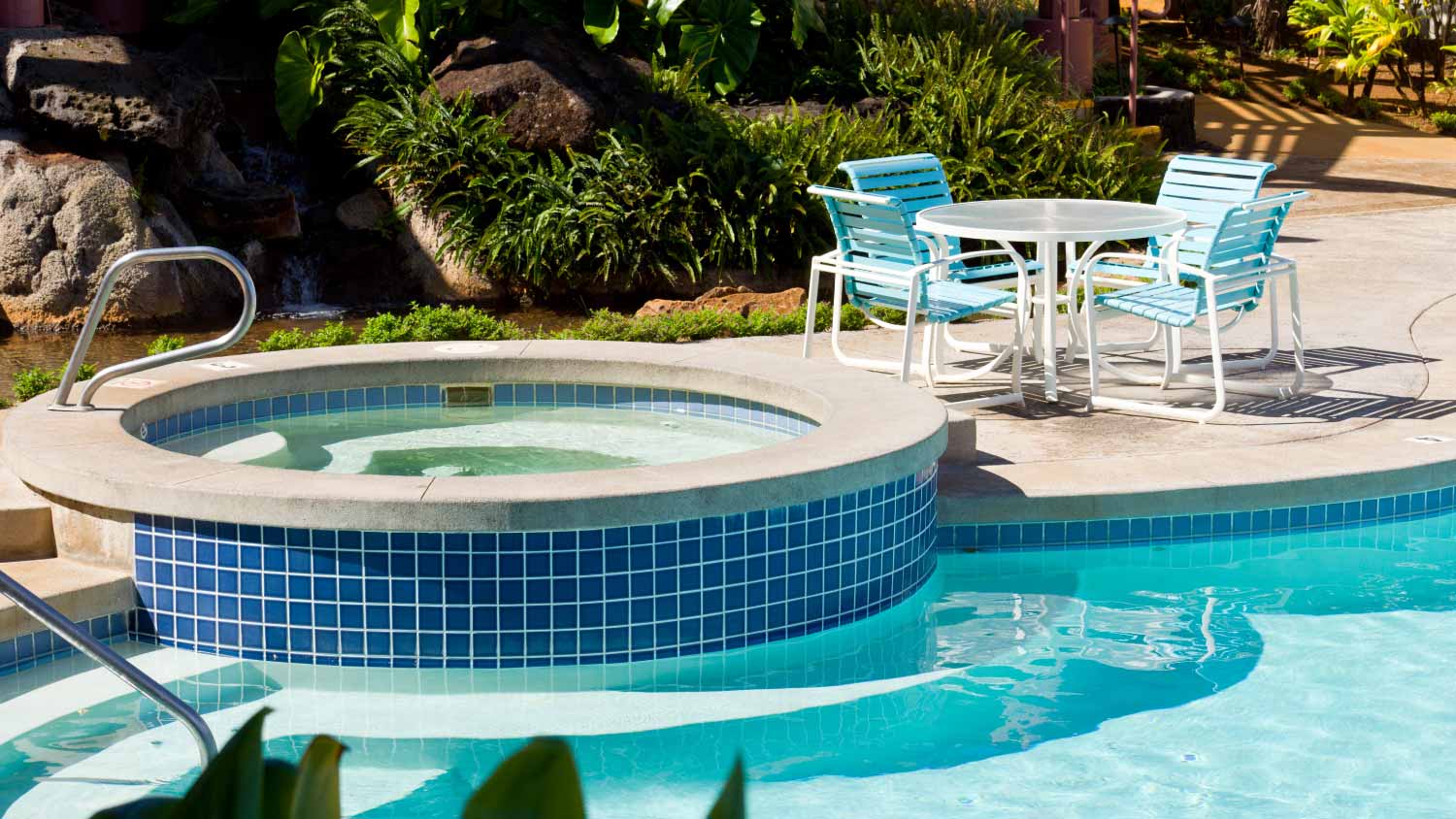 Pool and hot tub with table