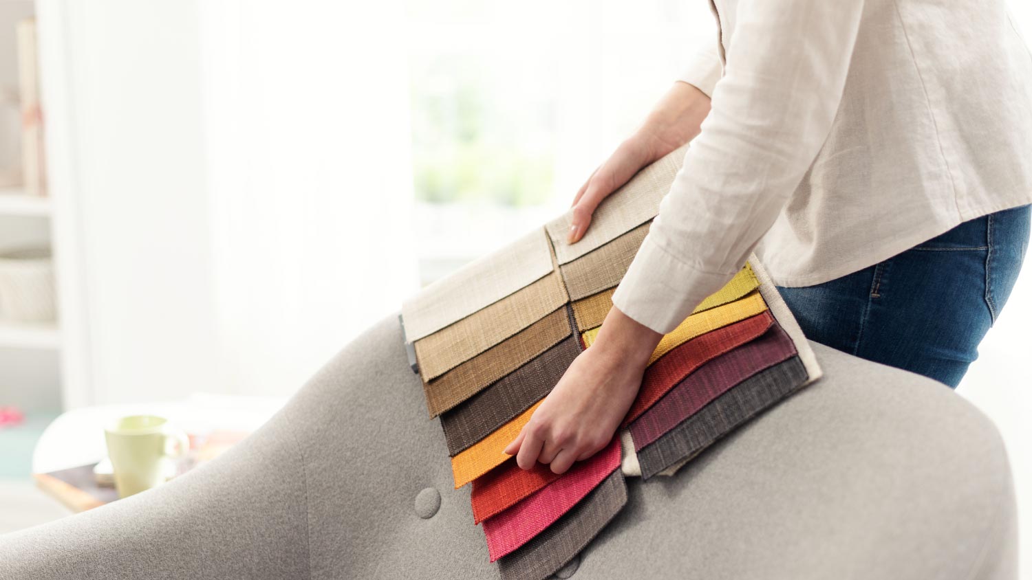 Professional decorator choosing the best upholstery