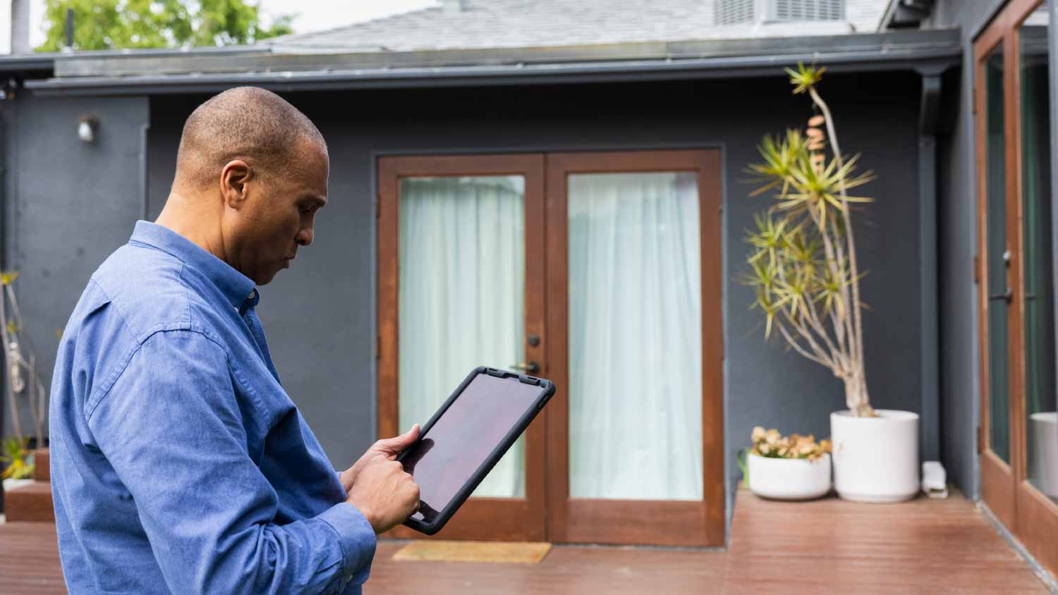 Real estate agent using digital tablet