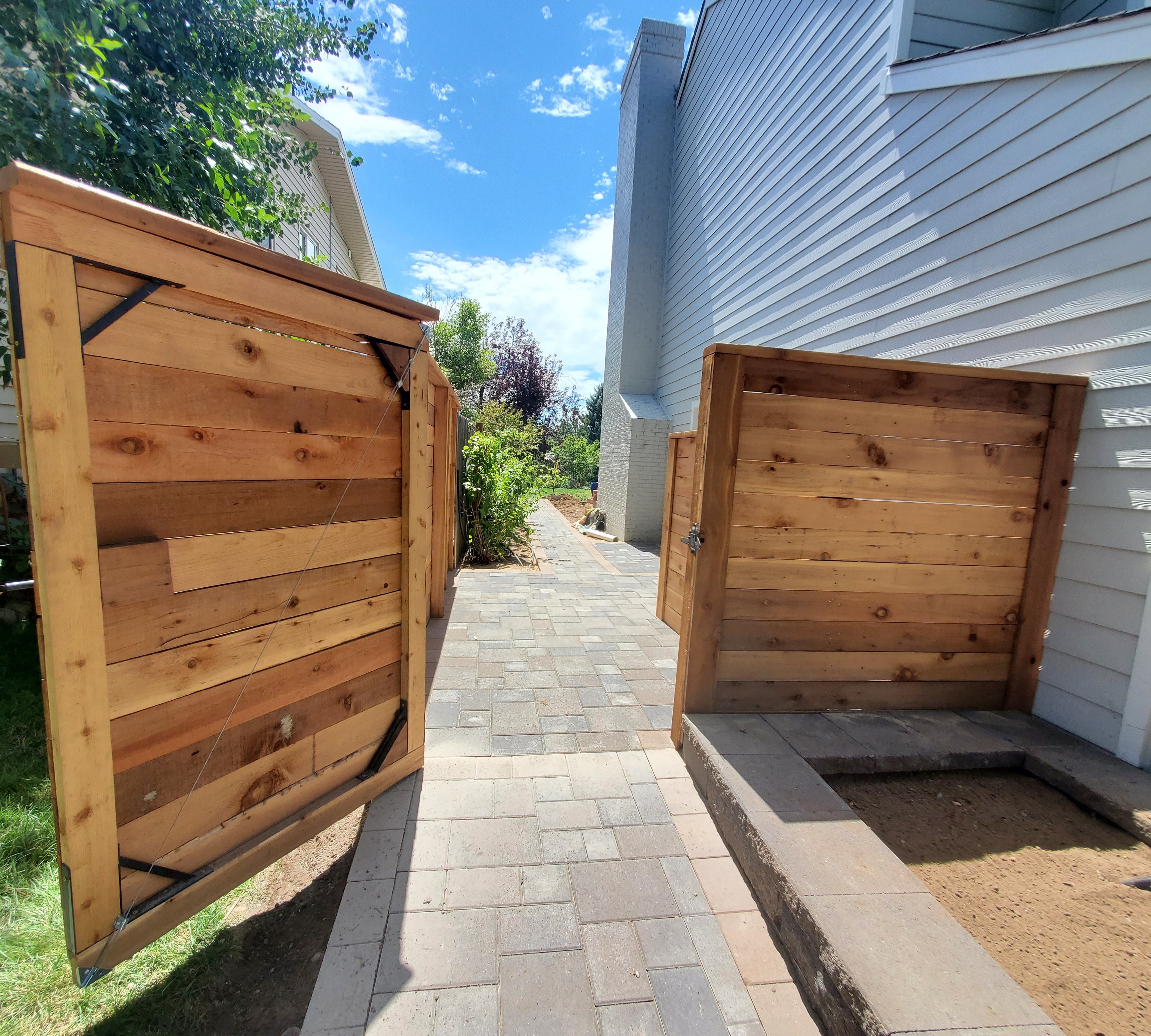 open wooden fence gate