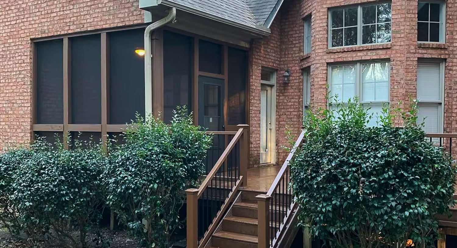 Screen porch in a brick house 