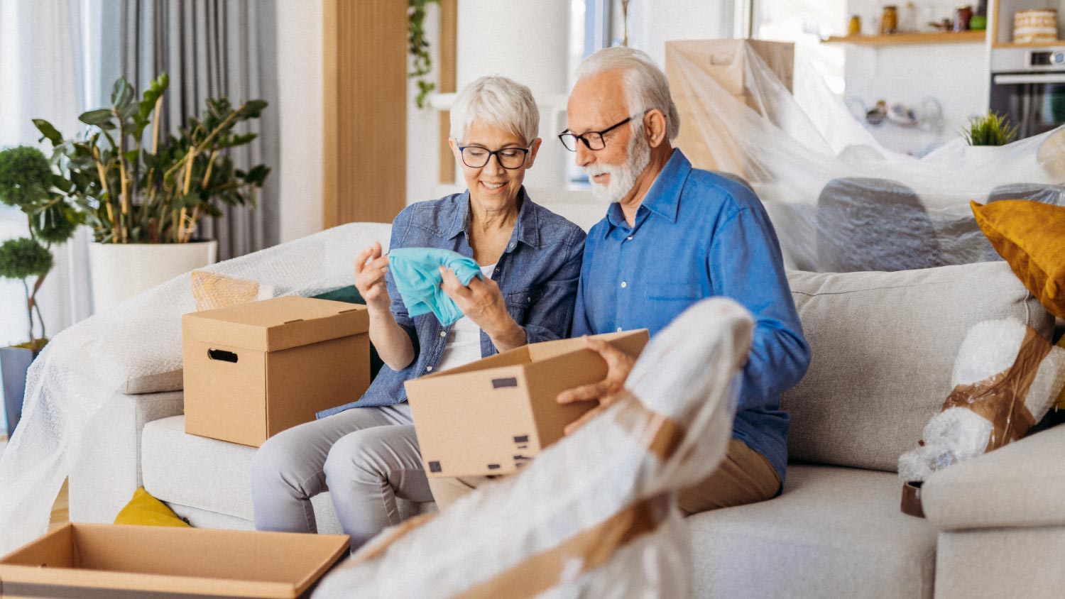 A senior couple moving to a new home