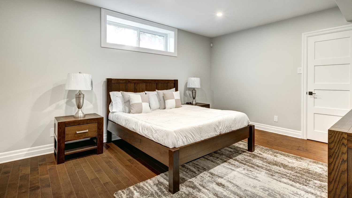 Basement bedroom with small window