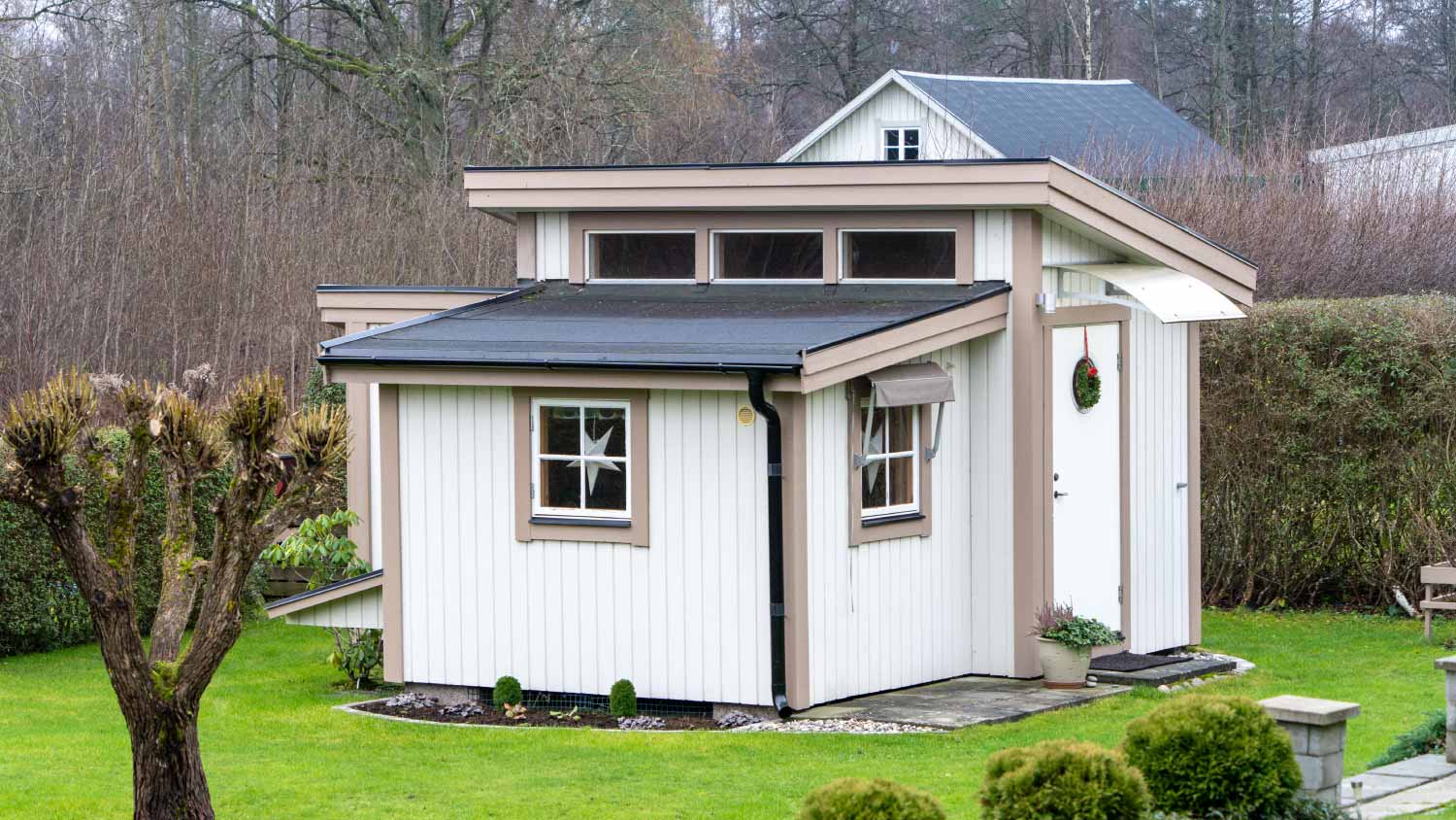 Small white wooden guest house