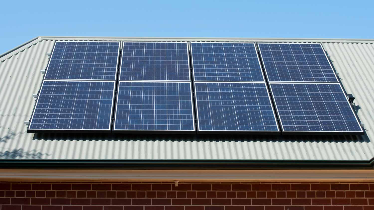 Solar panels on a corrugated house roof