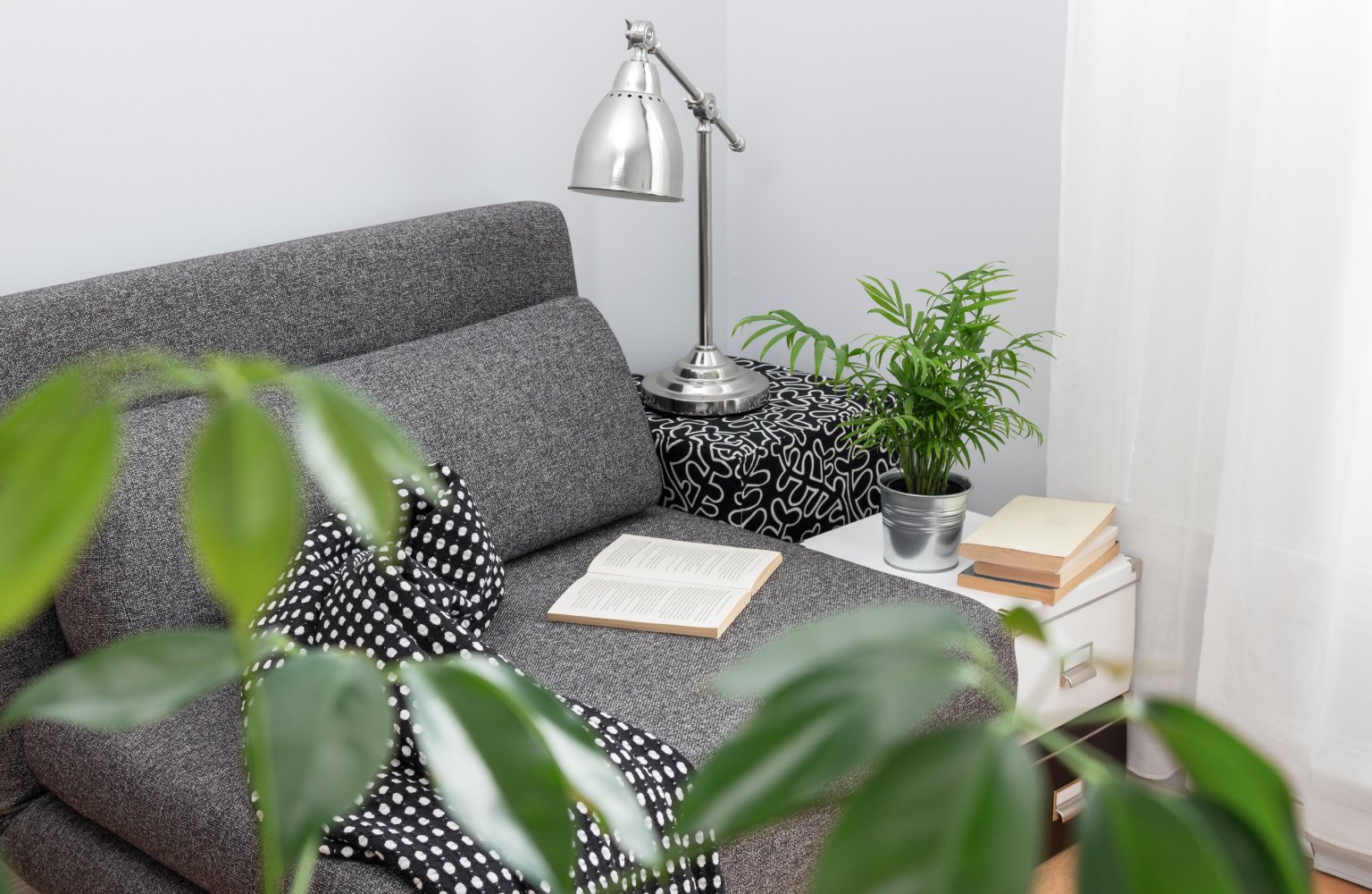 bedroom corner with sofa
