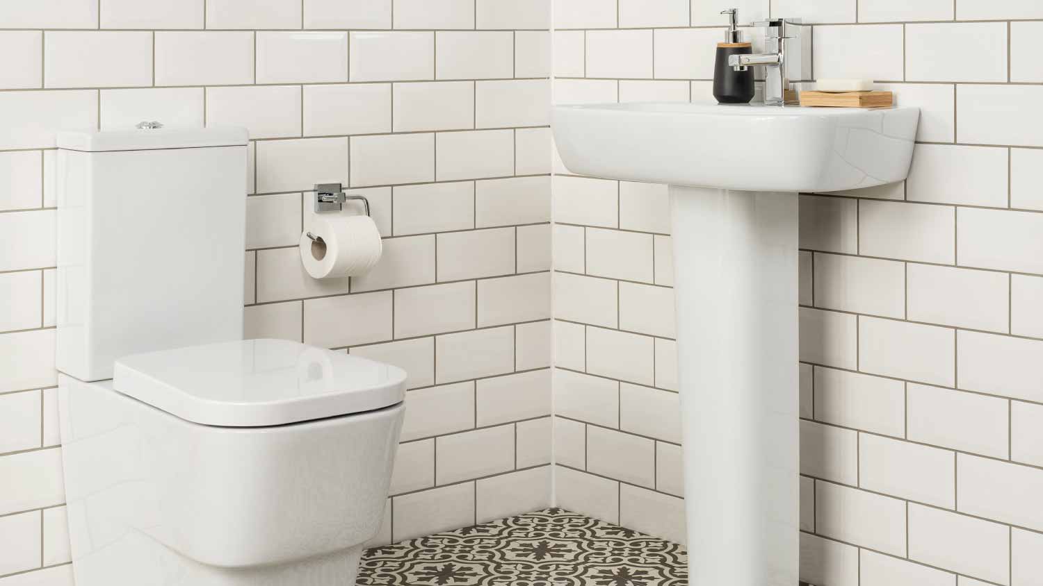 White classic pedestal sink and toilet