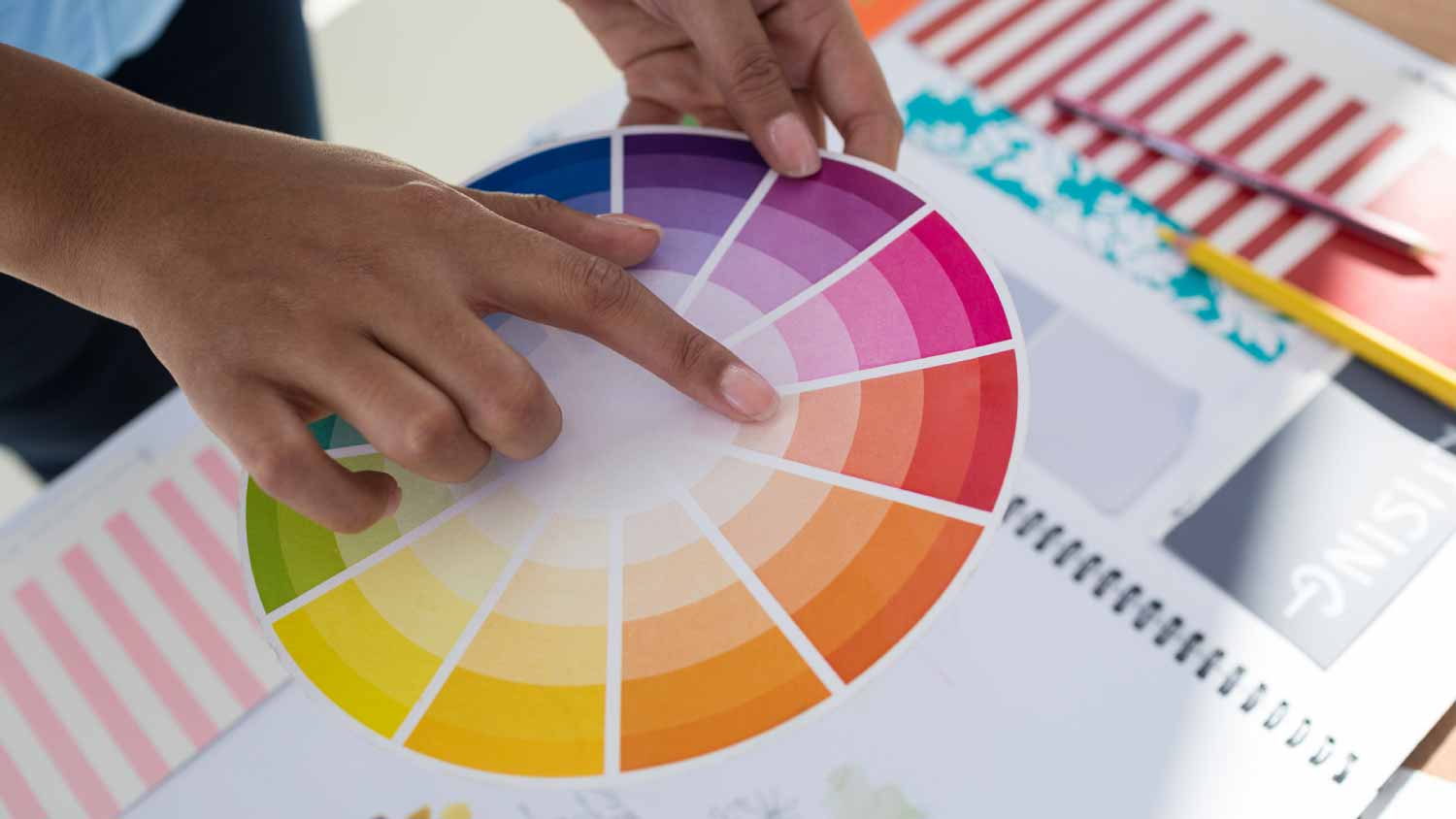 Woman holding color swatch