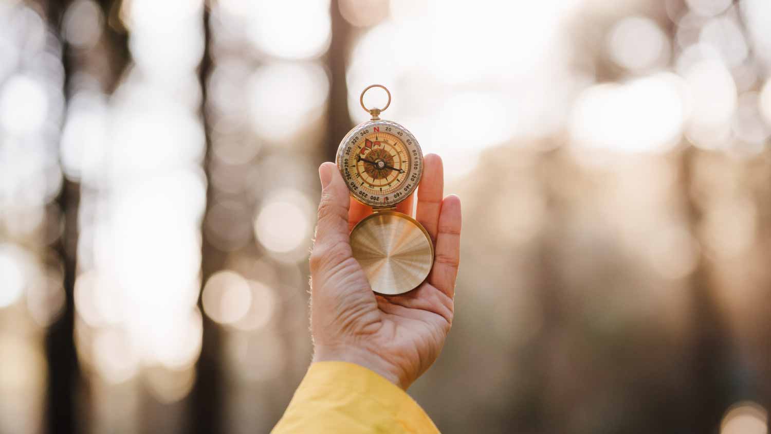 Woman holding compass