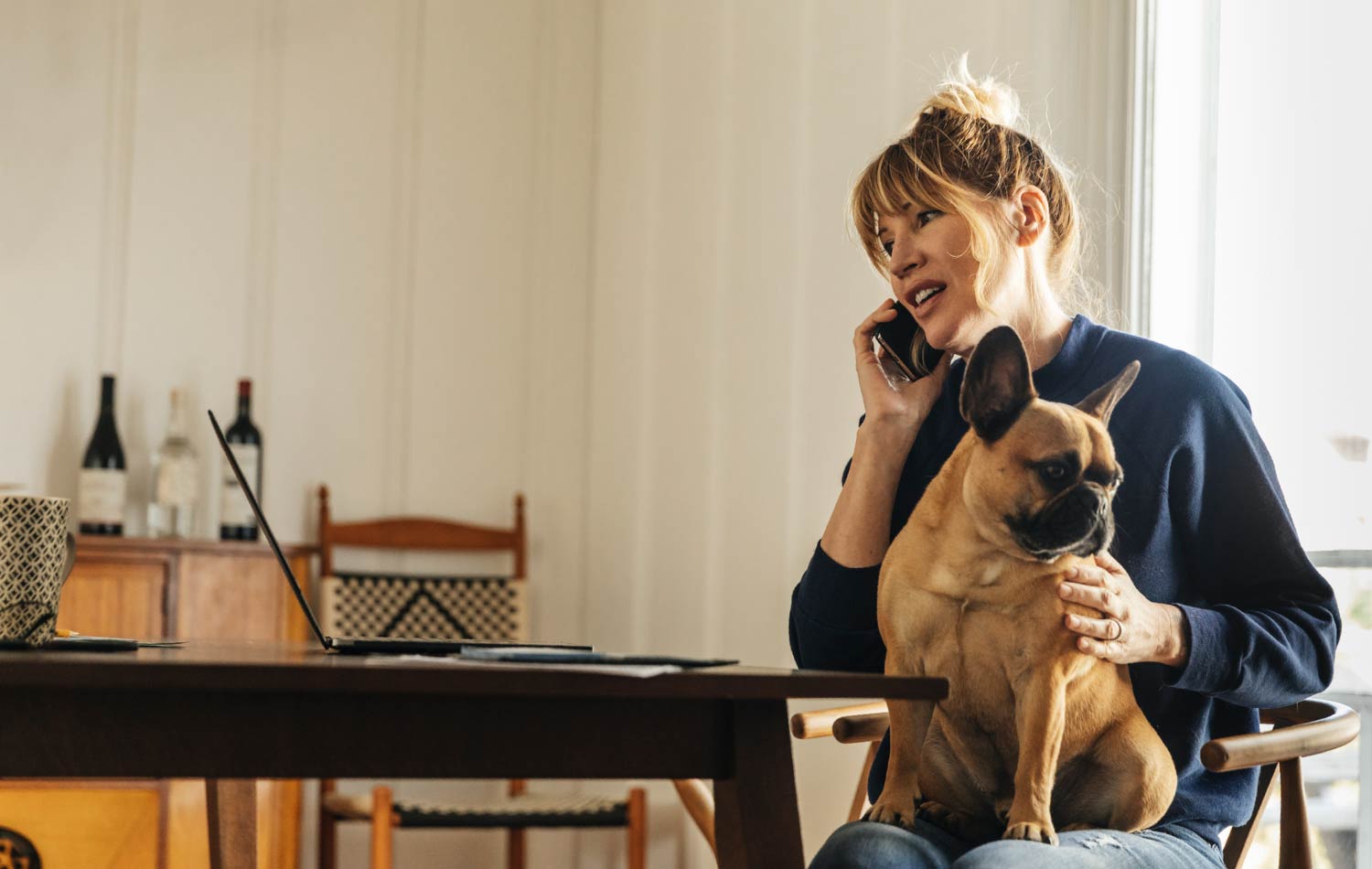 A woman talking by phone