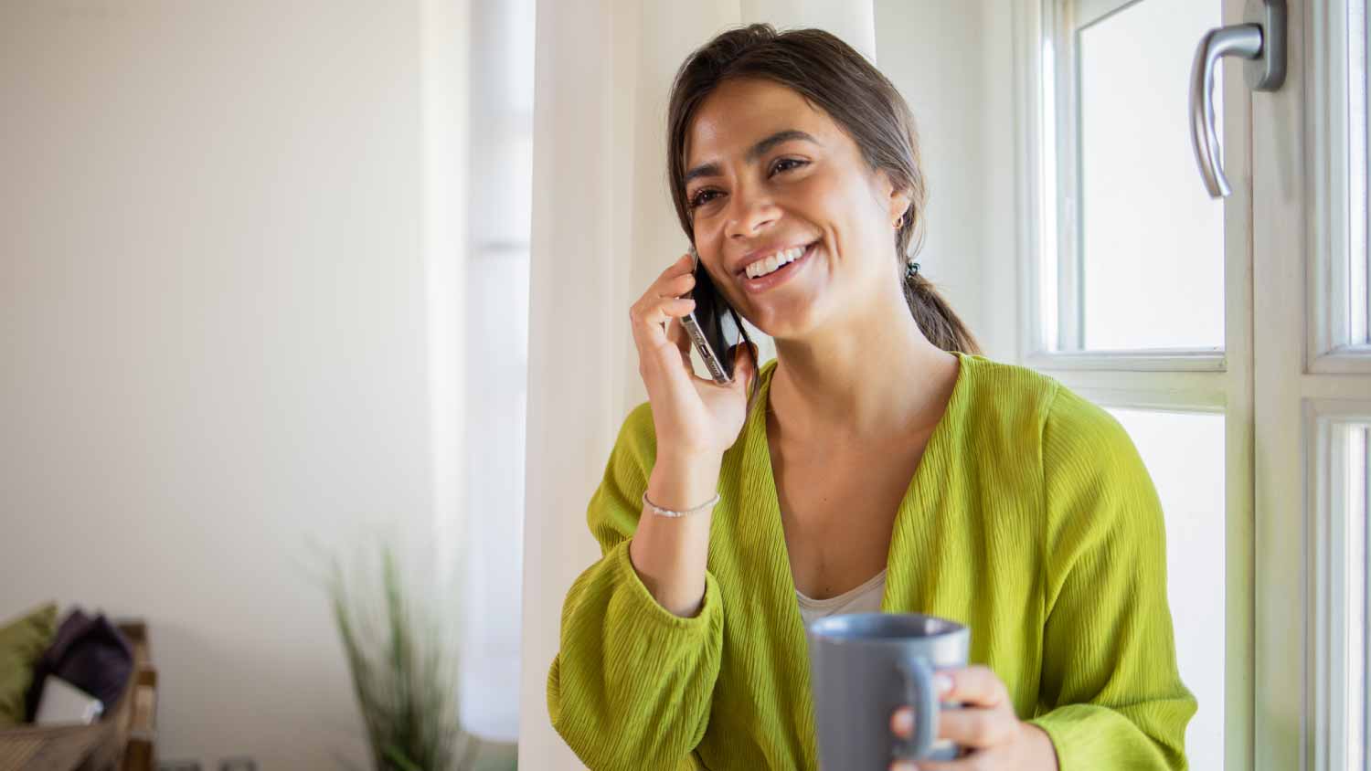 Woman talking by phone 