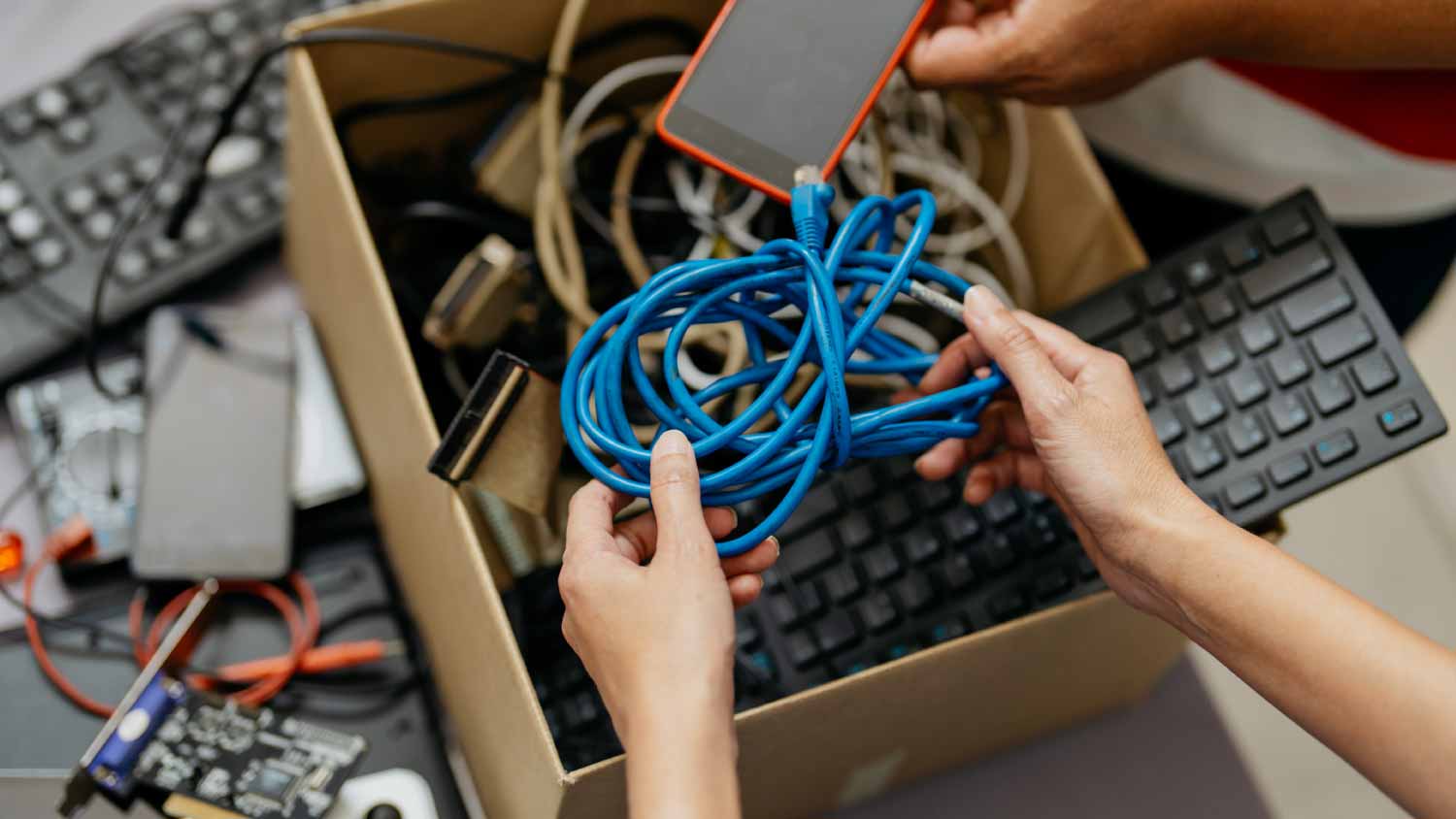 Women recycling electronic waste