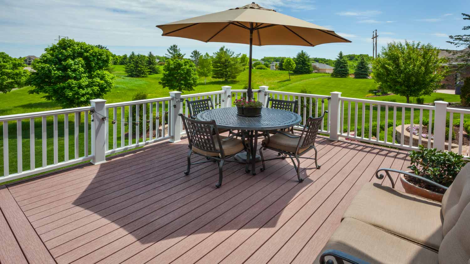 Wooden deck with table with an umbrella