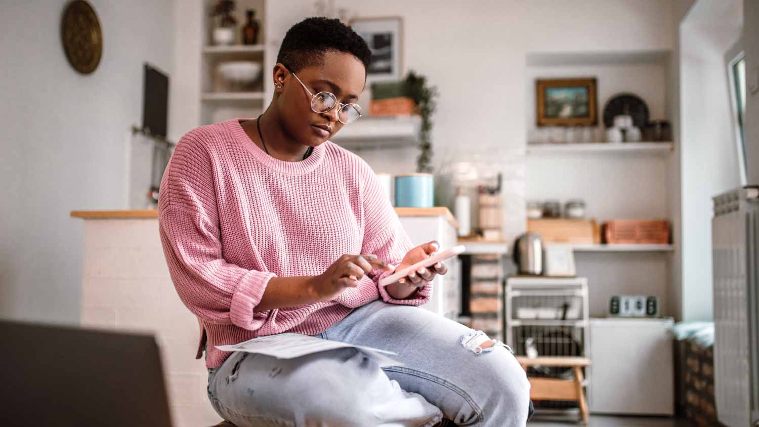 Young woman doing home finances