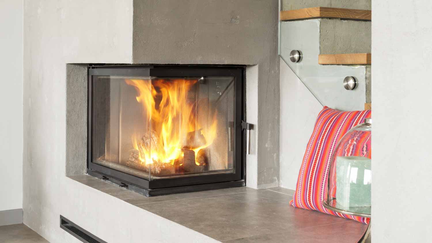 Concrete fireplace with white vases