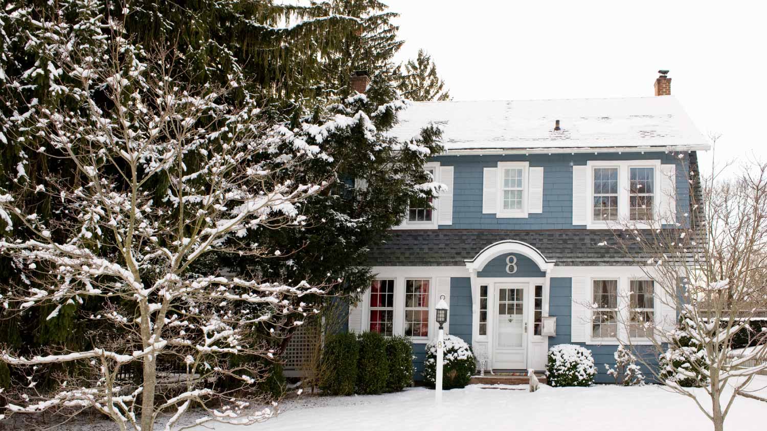 House with Snow in Winter