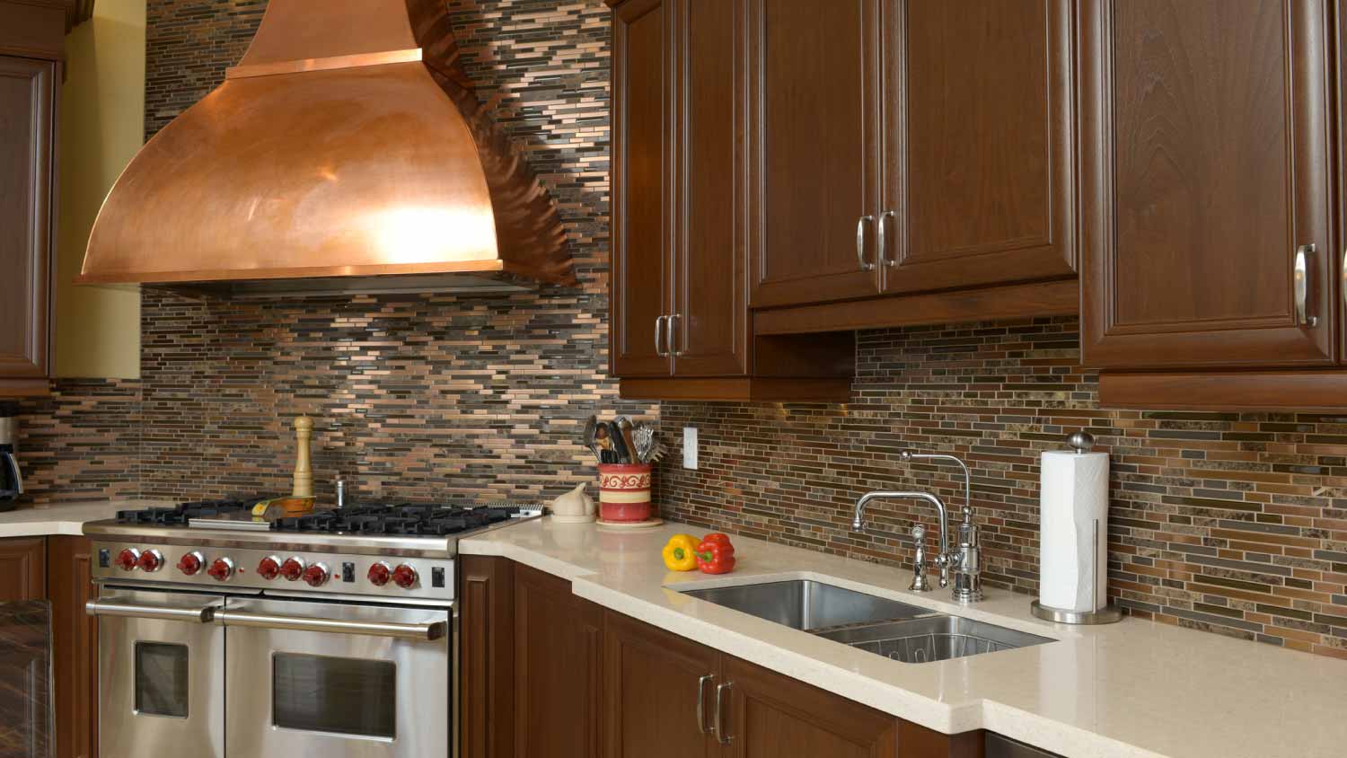 Kitchen with copper range hood