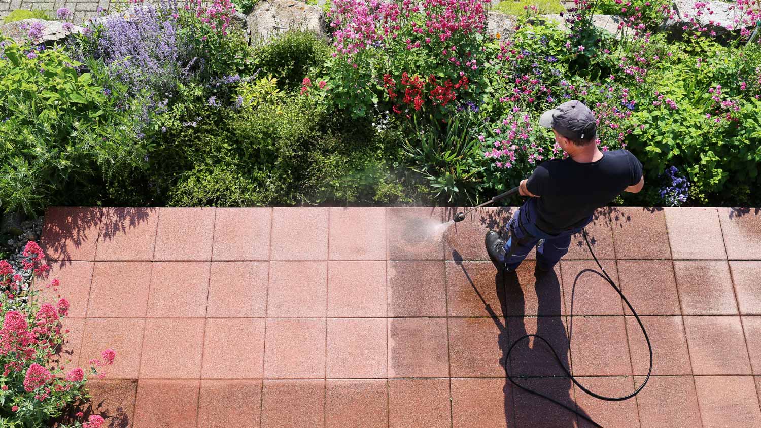 Man cleaning stone slabs