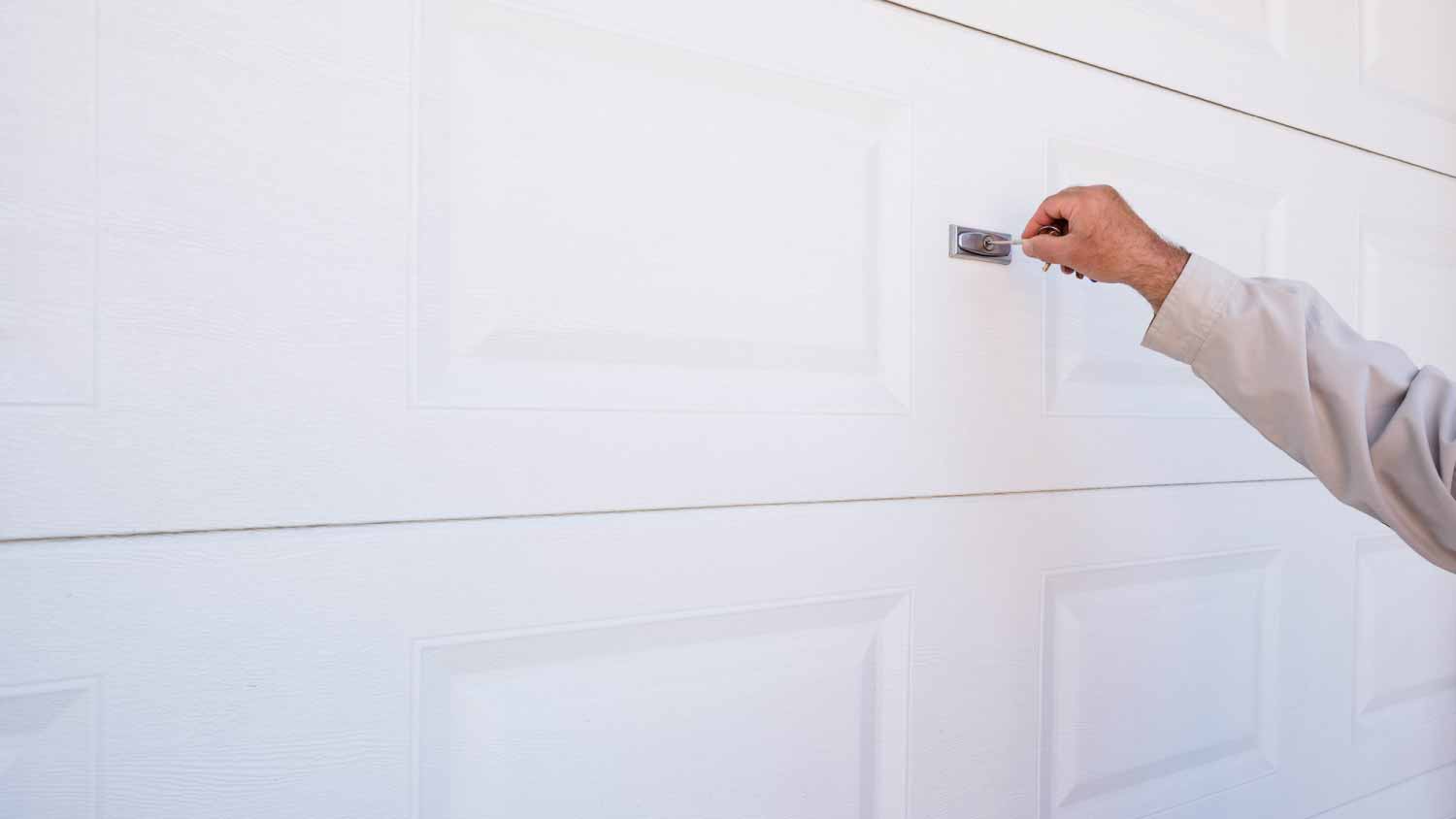 Man opening garage door