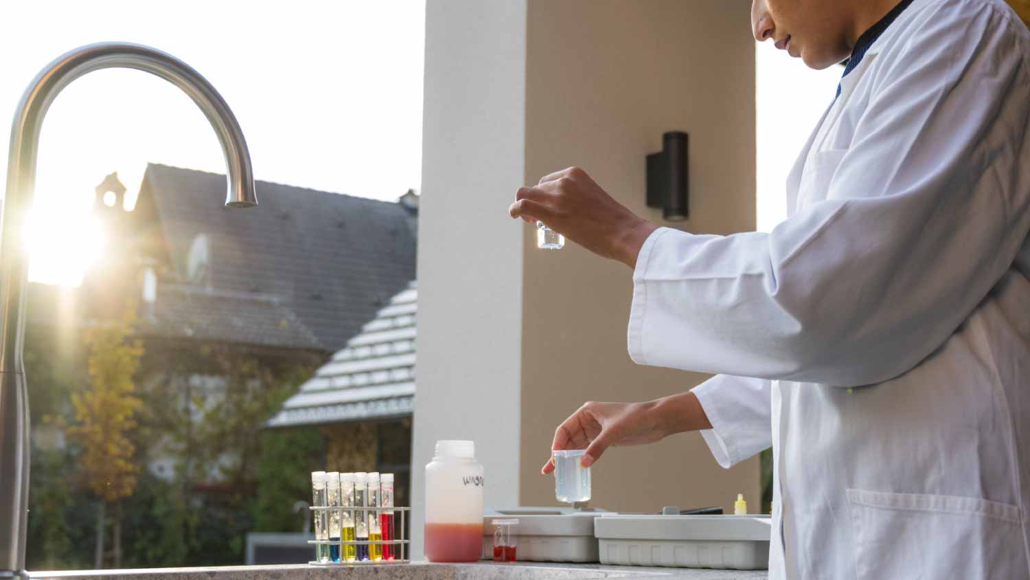 Woman testing water sample