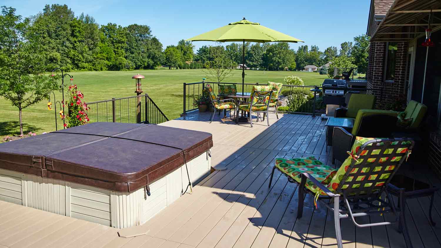 backyard deck with hot tub