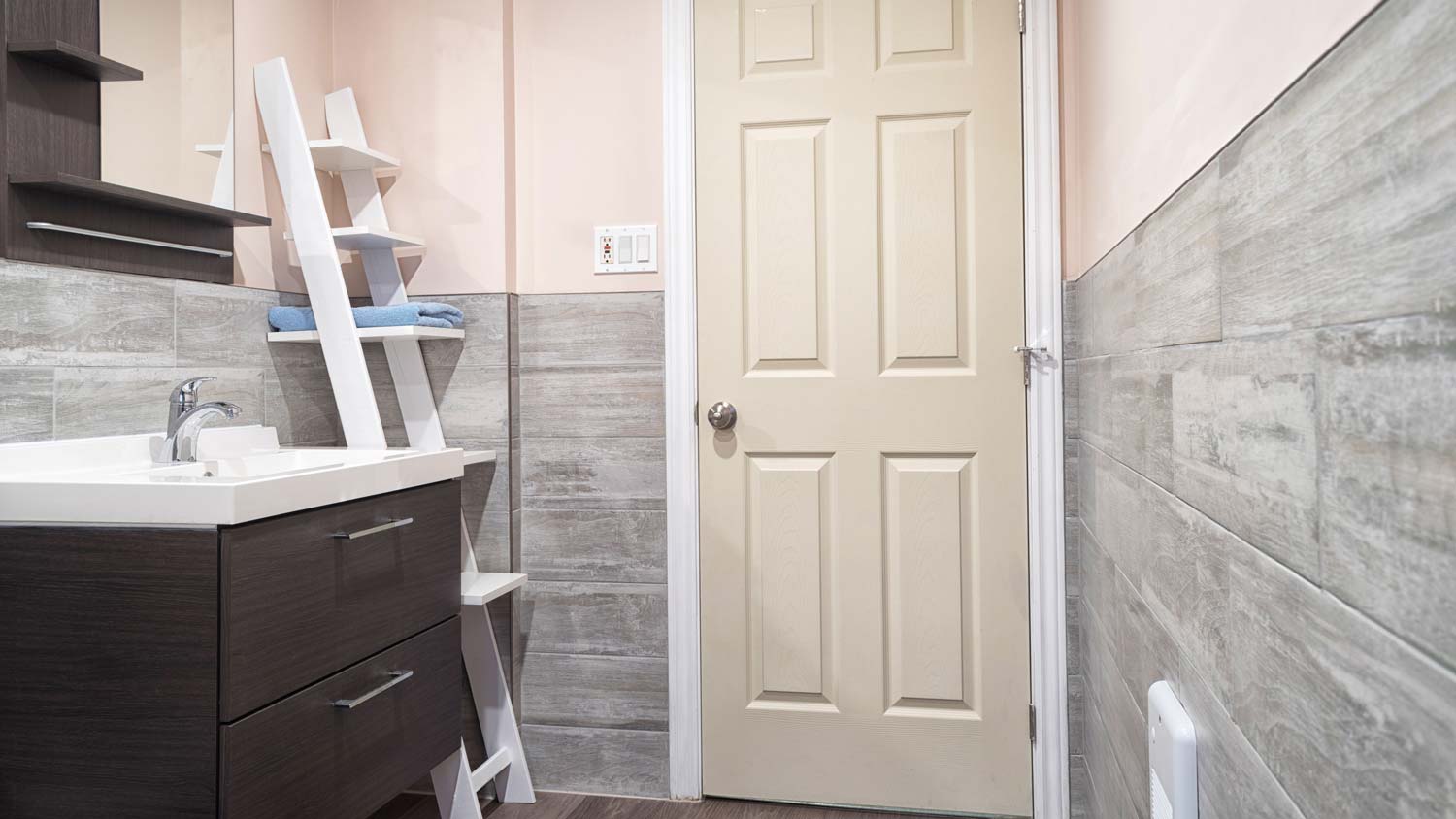 bathroom with beige door