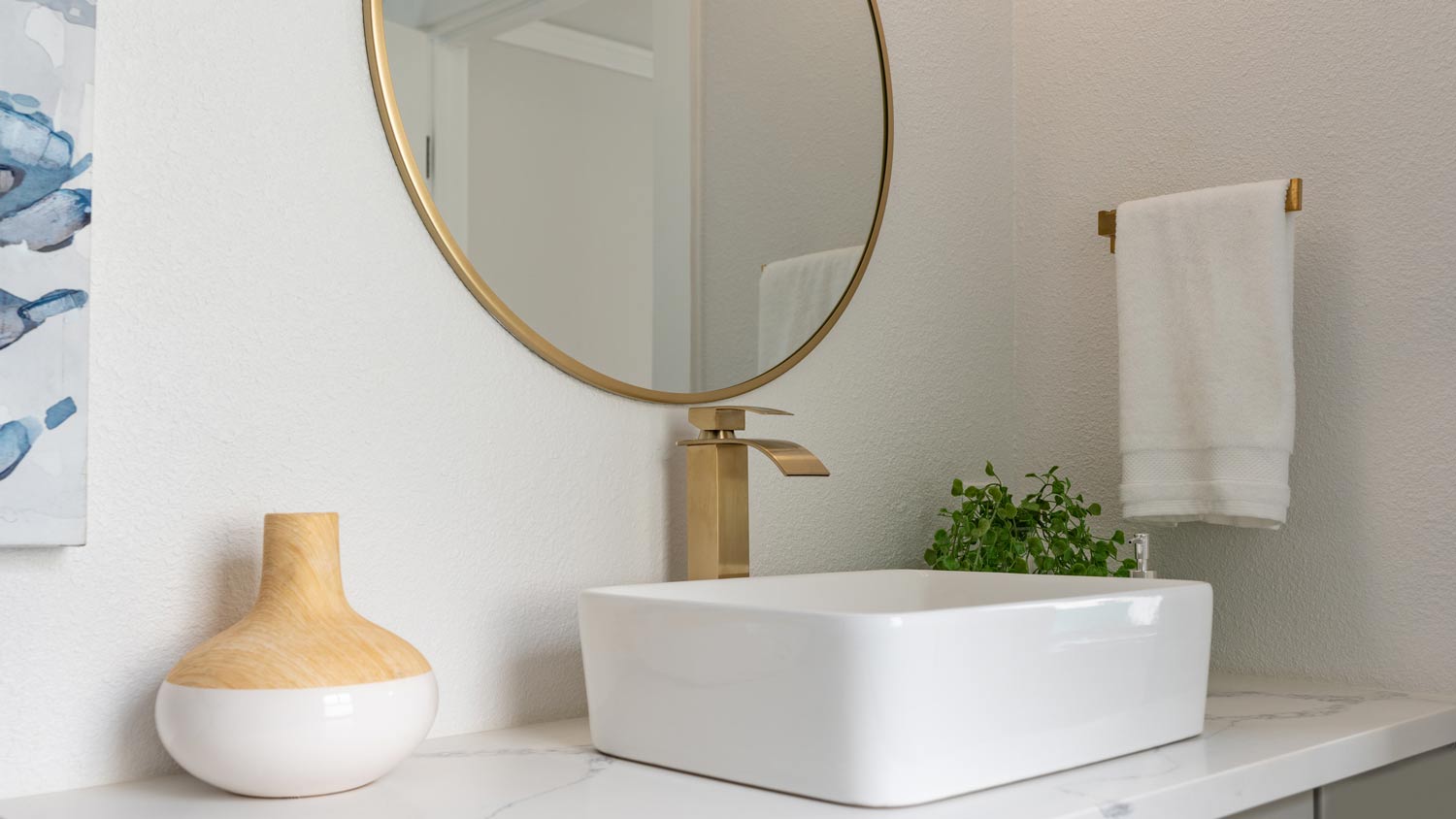 modern bathroom with gold hardware