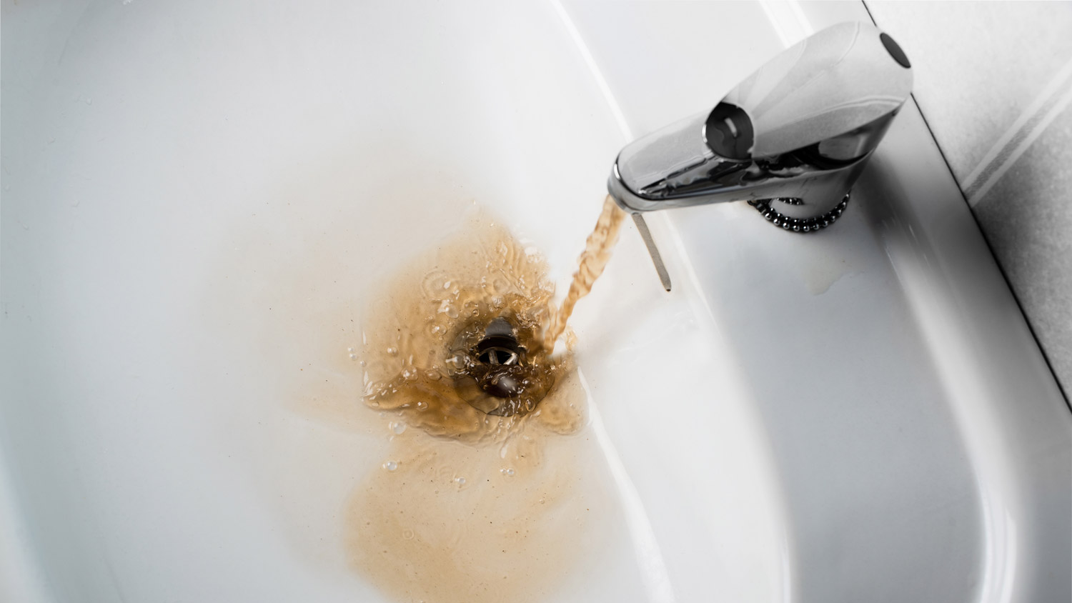 brown water coming from faucet