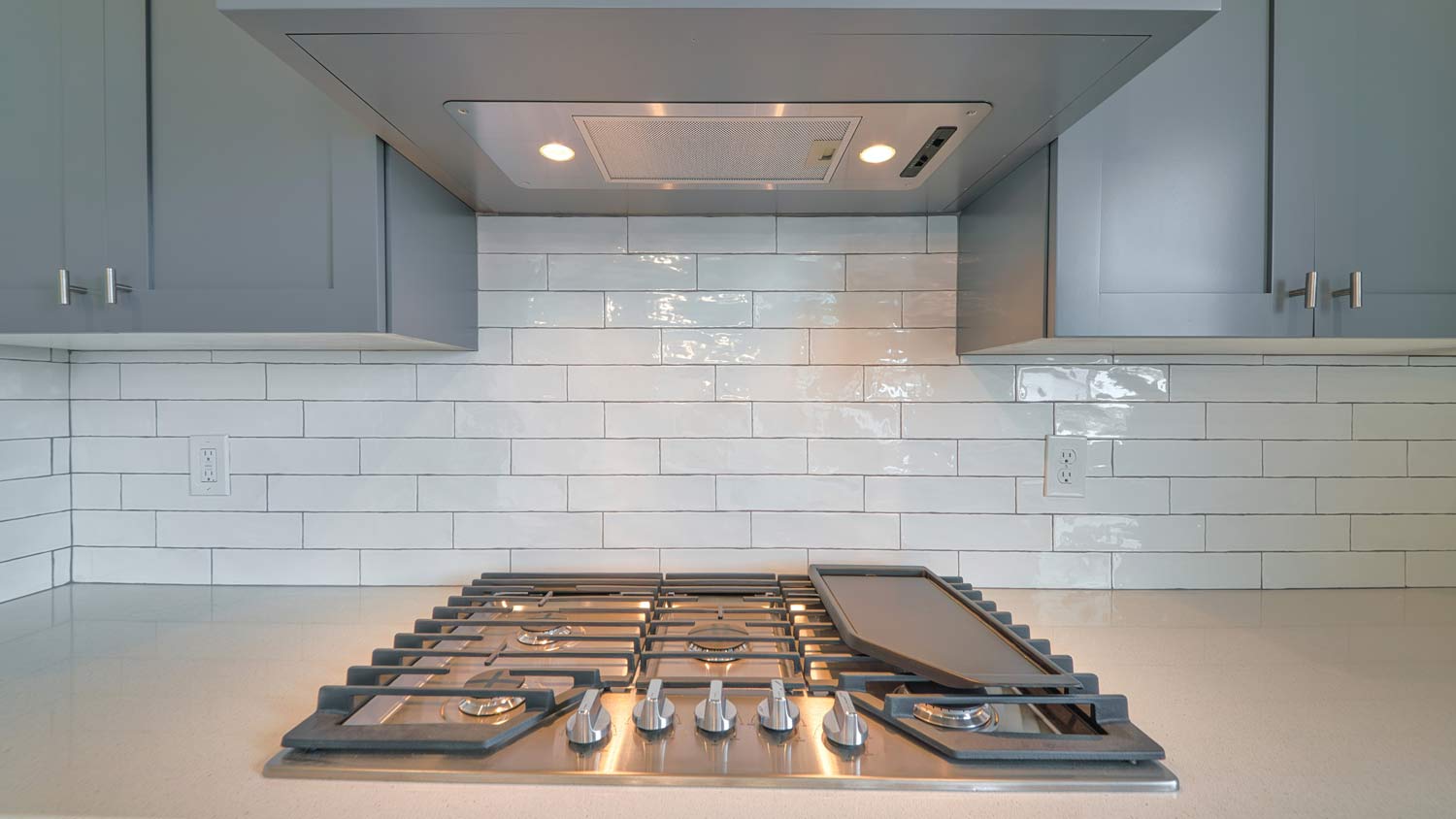 close up exhaust hood over stove