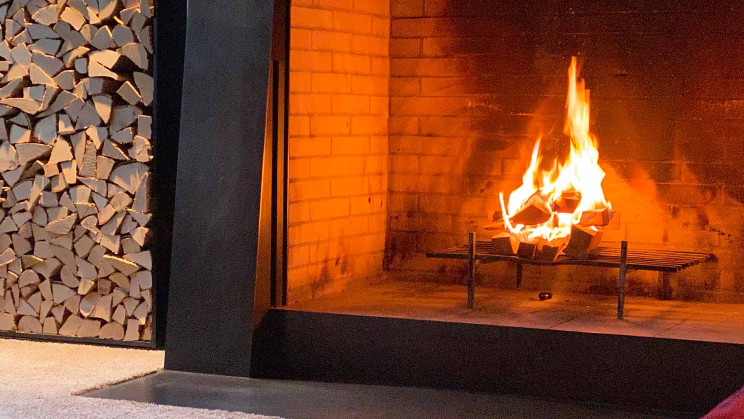 Firewood burning in the fireplace