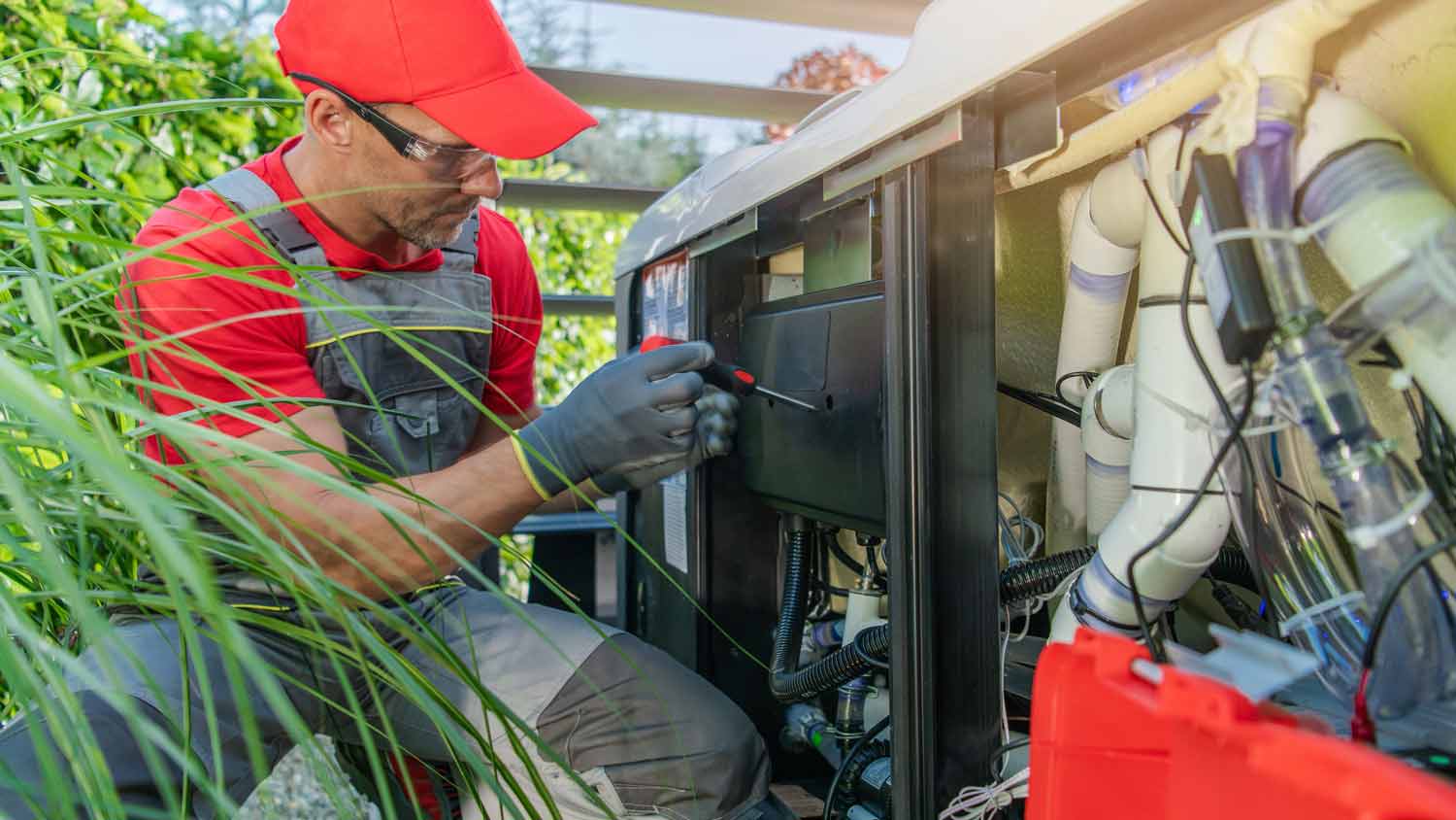 technician fixing hot tub