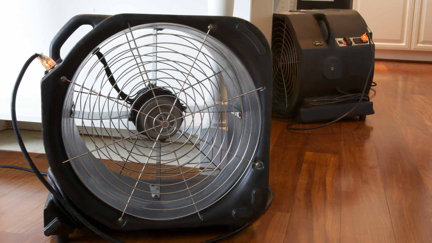 Industrial fans running to dry out leak damage