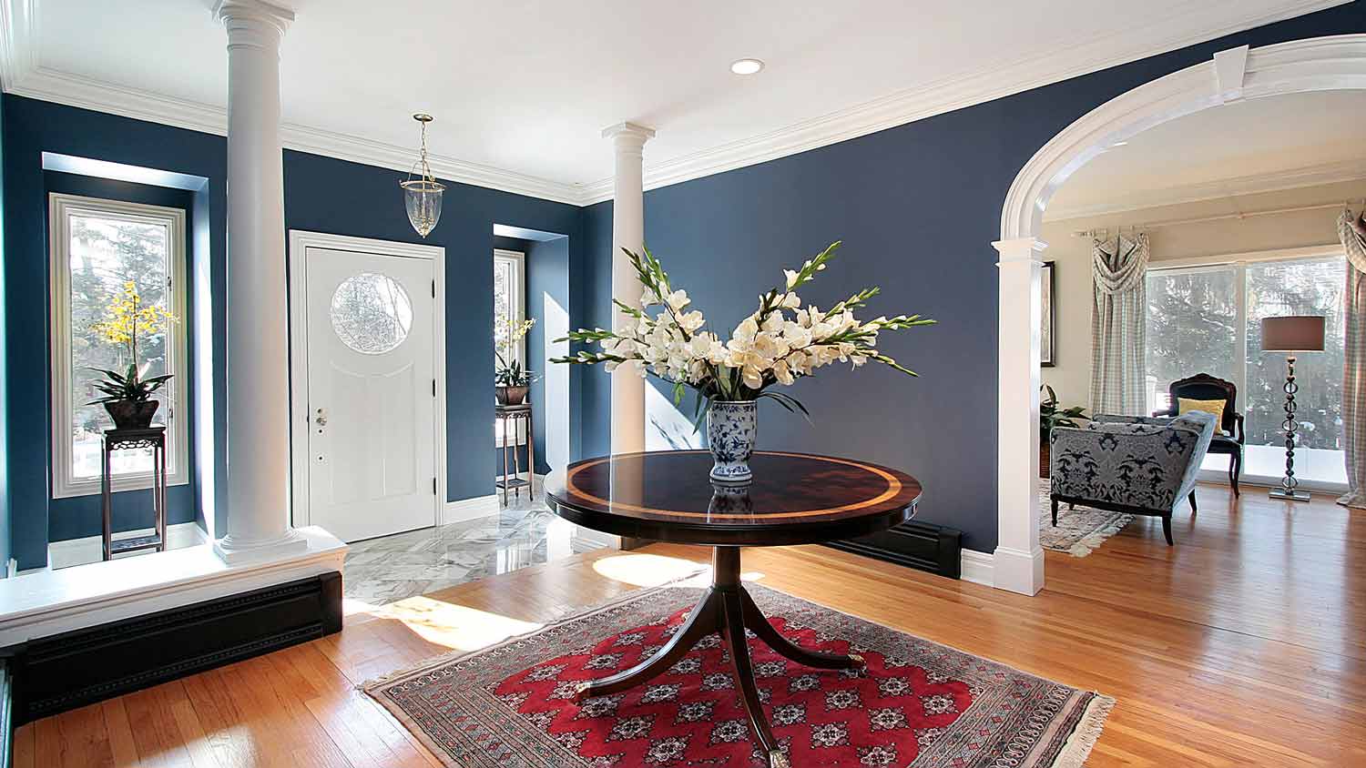 foyer with matte blue walls