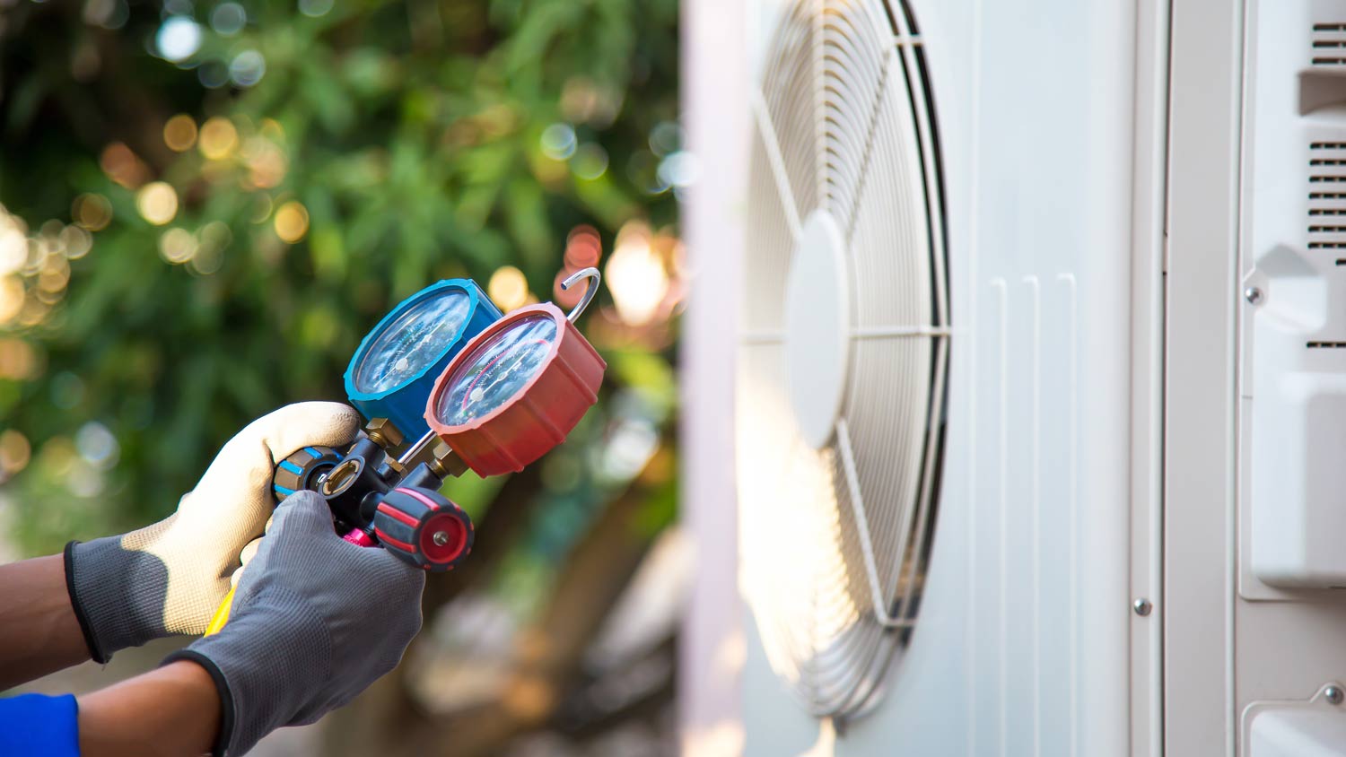 mechanic conducting air duct cleaning