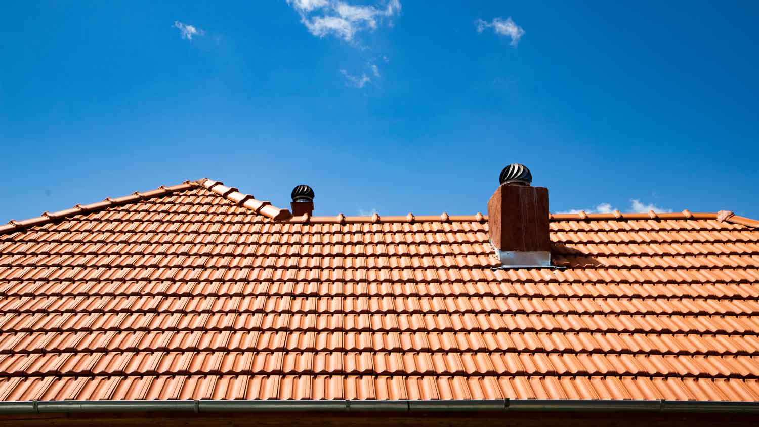 new red clay tiles on roof   