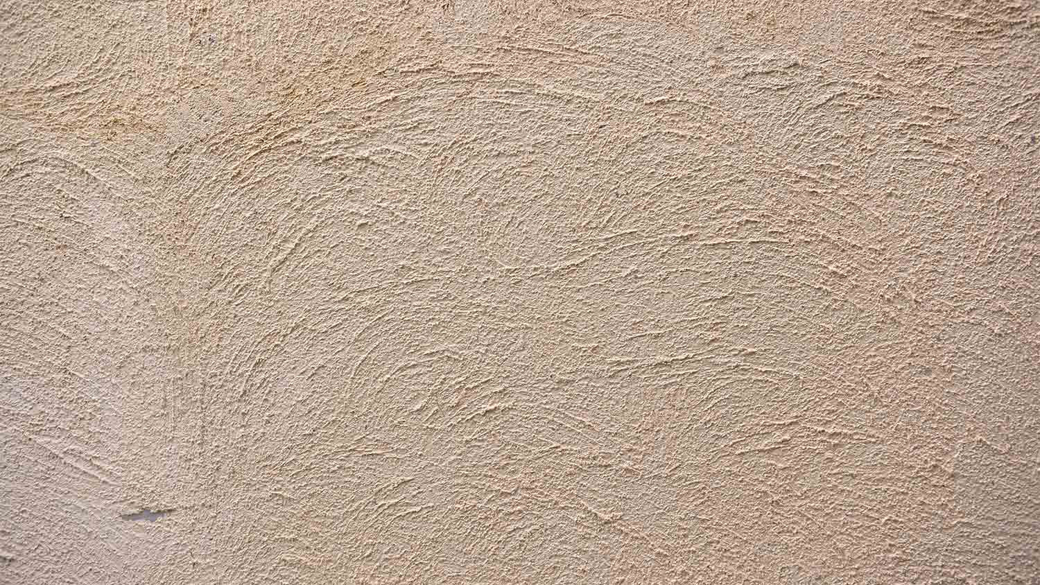 close up of stucco siding