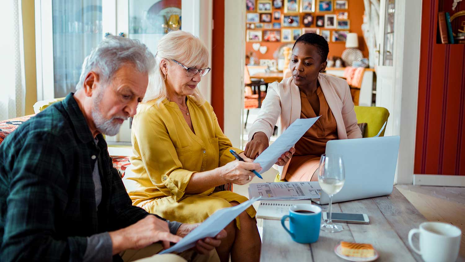 Financial advisor helping senior couple