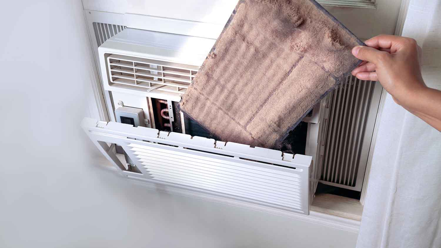 Removing dirty air conditioner filter