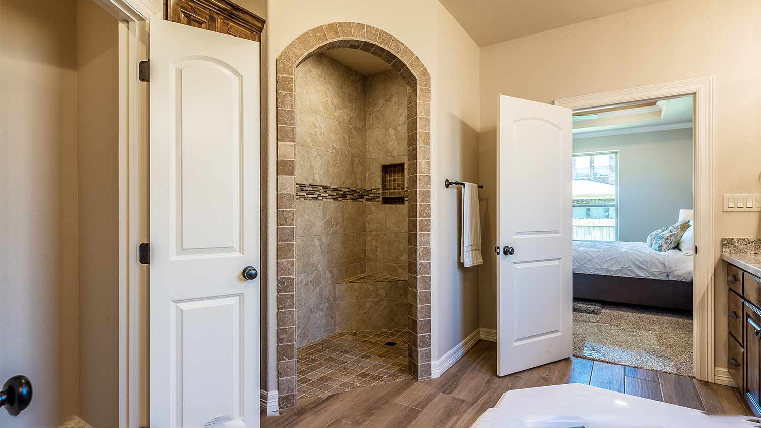 walk in shower with arch