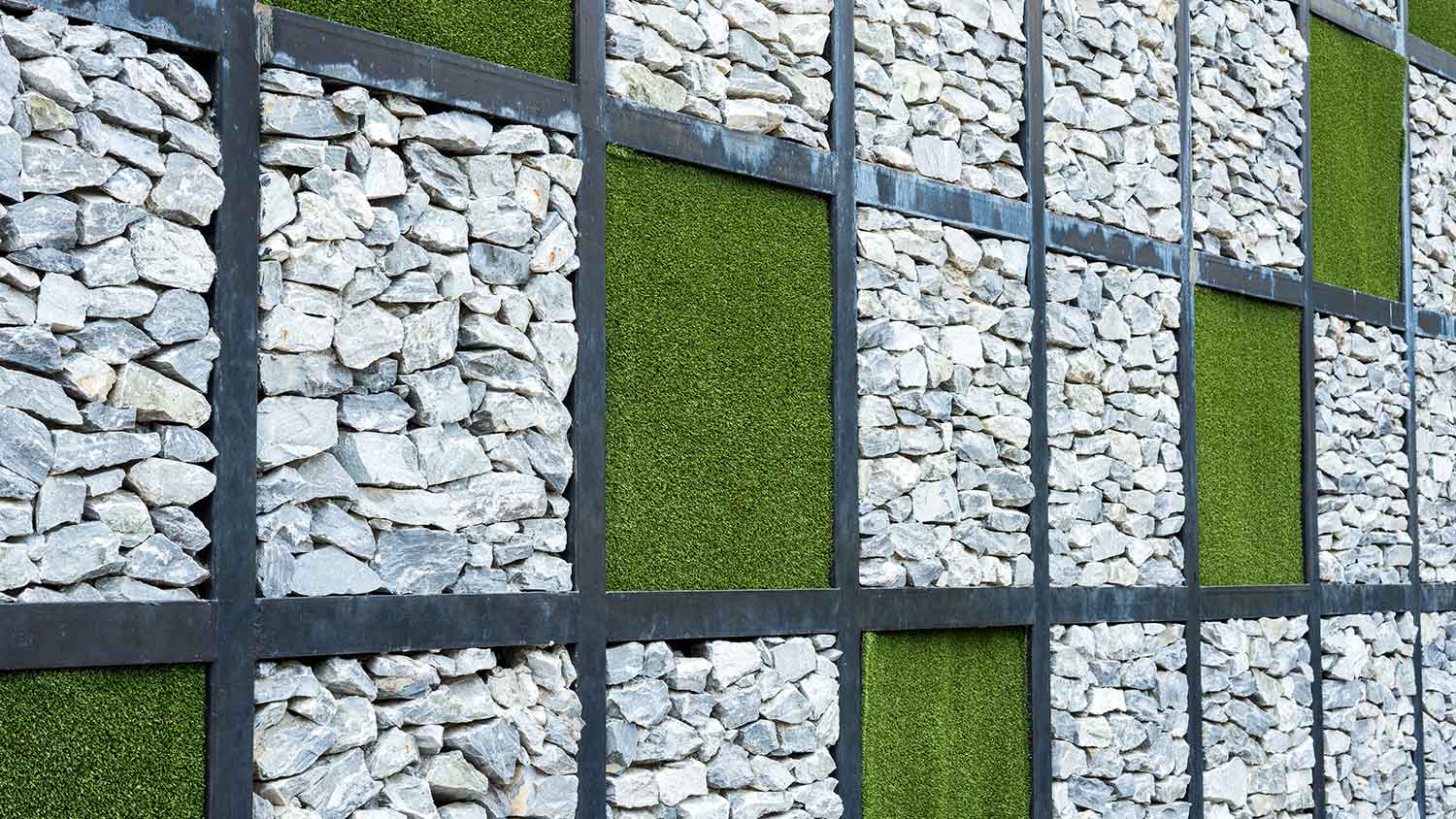 Wall with artificial grass and stone