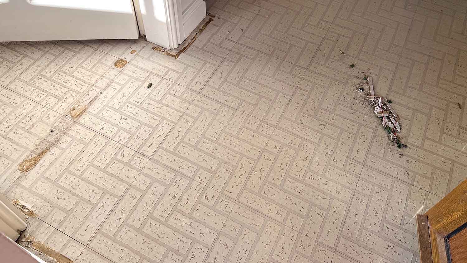 Asbestos tile floor installed in an old house