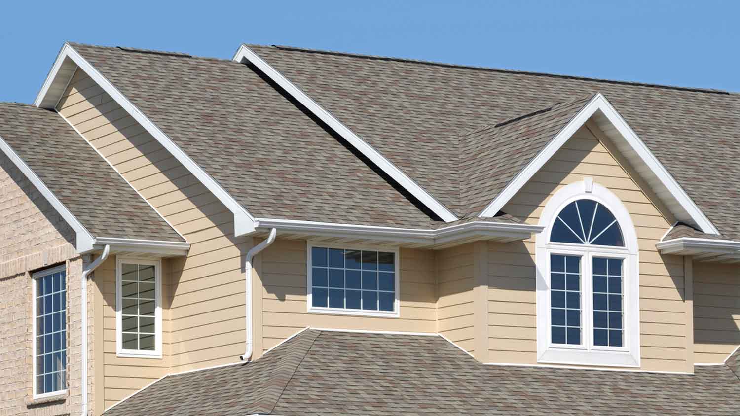 Asphalt shingles installed on the roof of a house