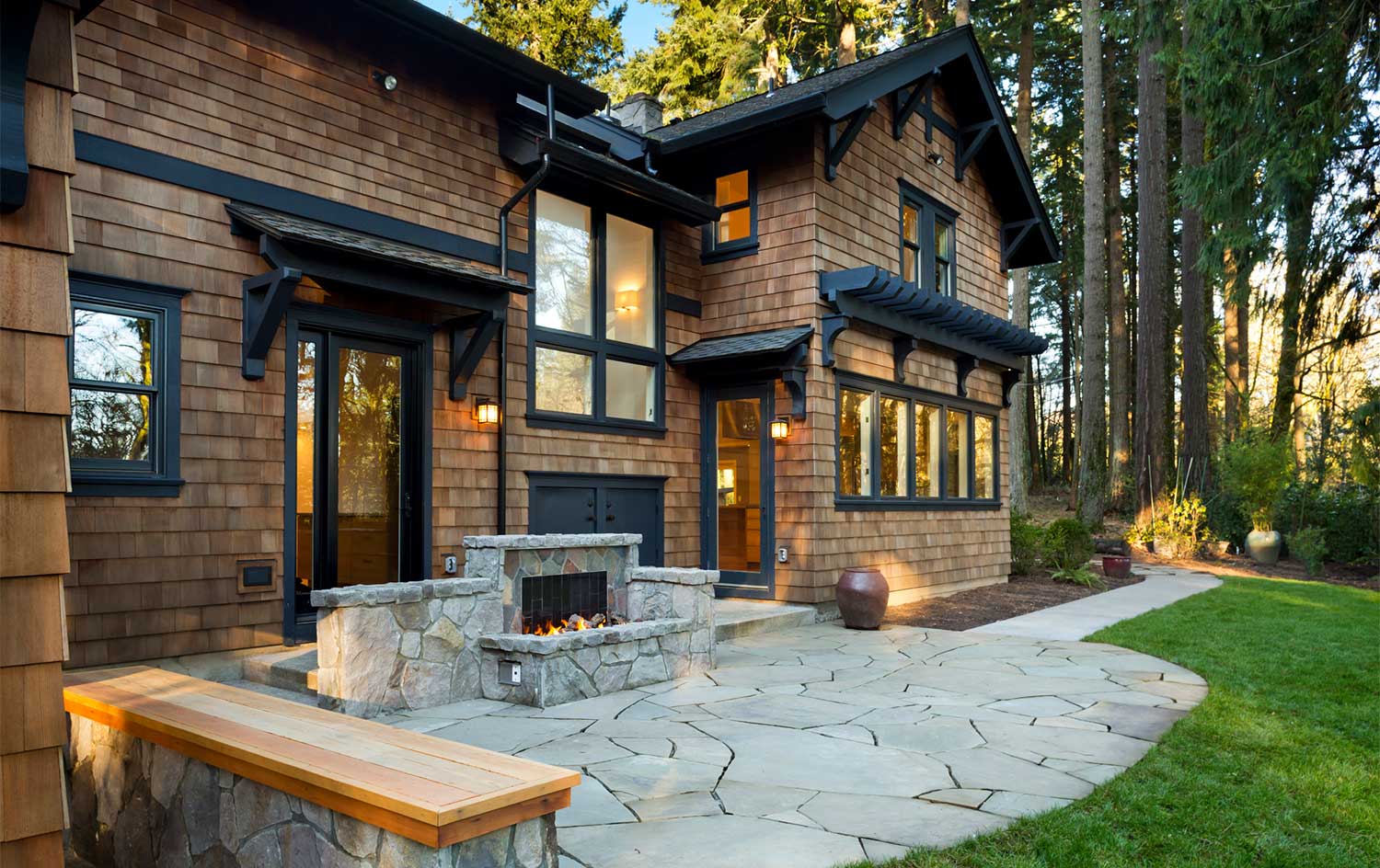 Back patio with stone path way and fireplace